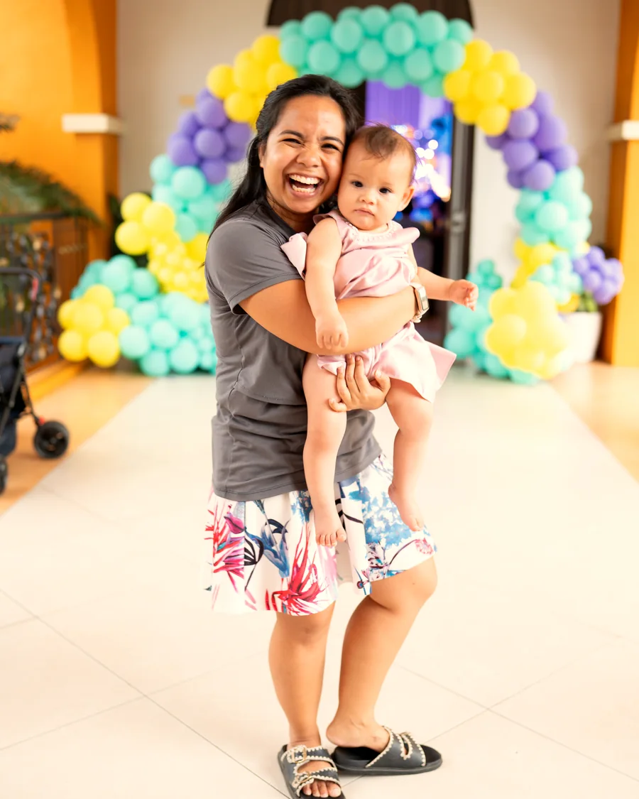 Kathy holding her daughter Ligaya